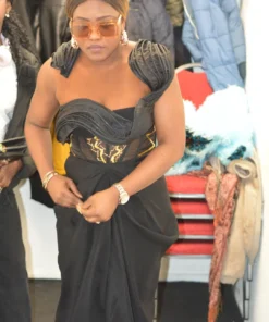 a woman in our wemmy black dress